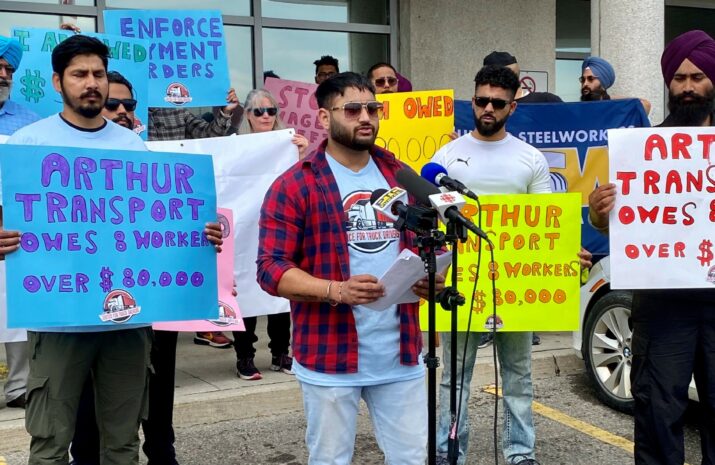 Picture of truck drivers protesting unpaid wages