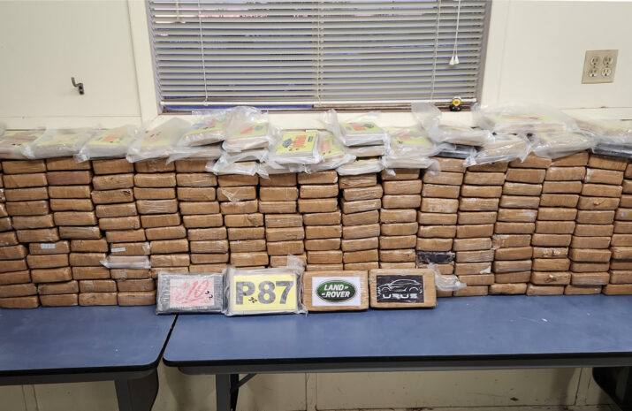 Picture of cocaine packages discovered in commercial vehicle.