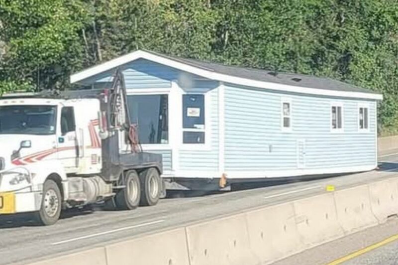 Picture of a oversized load that slid off a trailer