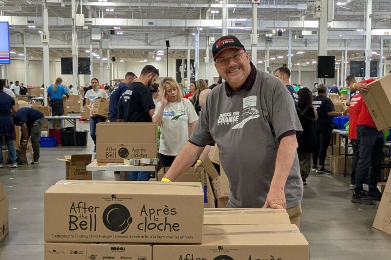 Guy Broderick with boxes on the pallet -- cropped