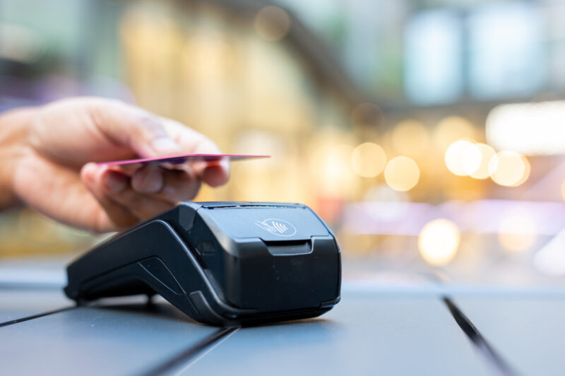 Credit card being used at checkout