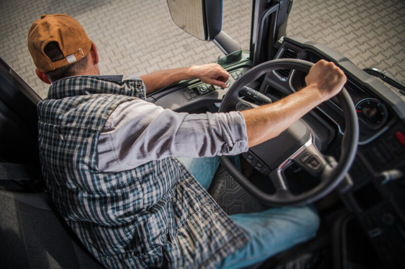 A student backs up a truck.