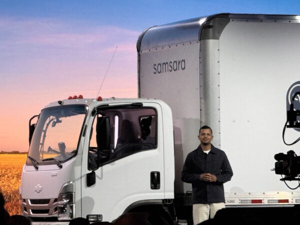 Arpan Podduturi near the truck on stage