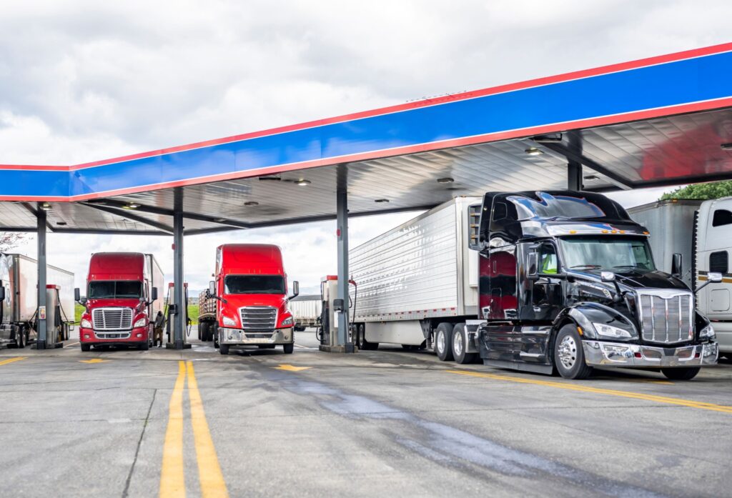 trucks at fuel pumps