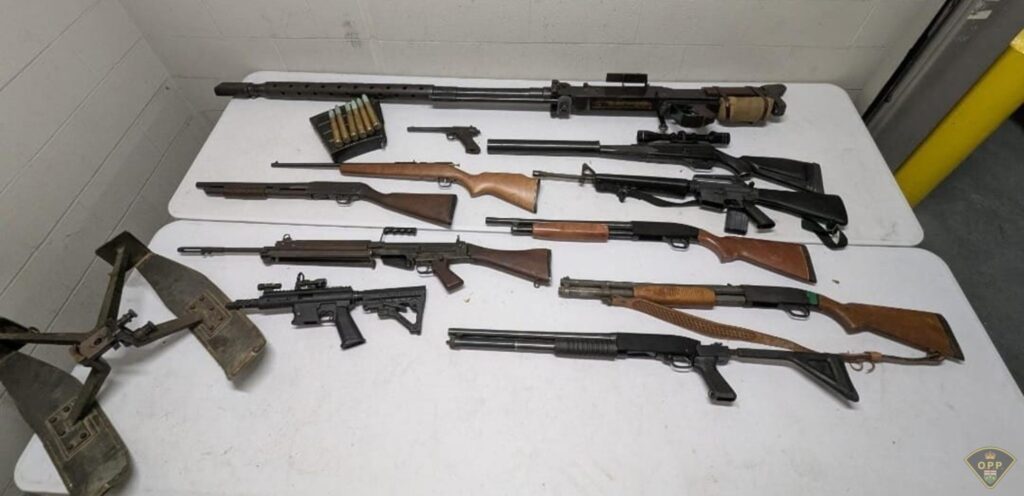 Firearms laid on tables